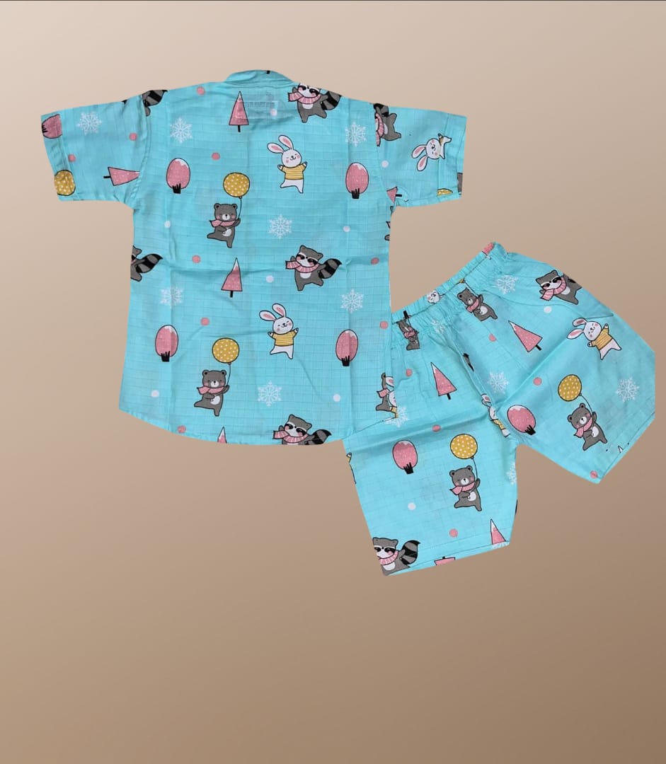 Children's pajama set with animal pattern on a beige background