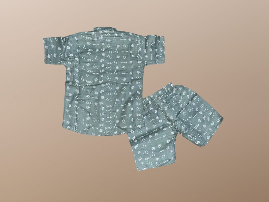Set of blue pajamas with white patterns on a beige background