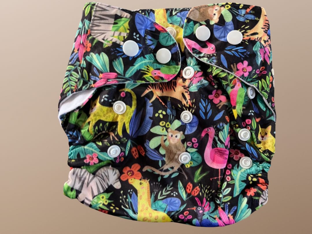 Colorful diaper with animal pattern on a beige background