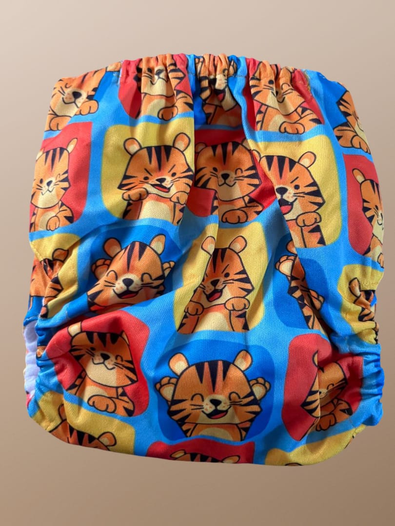Colorful diaper with tiger pattern on a beige background